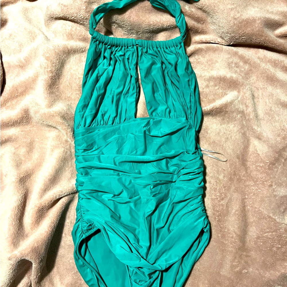 One piece toe around neck bathing suit.